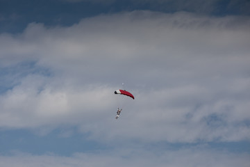 Skydive, people in the sky, under clouds