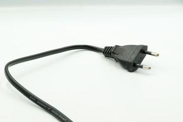 This is a capture for an AC black power cord the picture is taken with a white background and a studio light