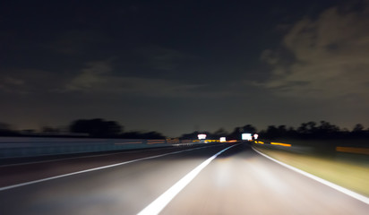 Fototapeta premium Car Trails on a Highway by Night