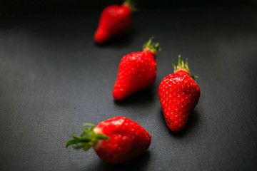 Delicious strawberrys on black background