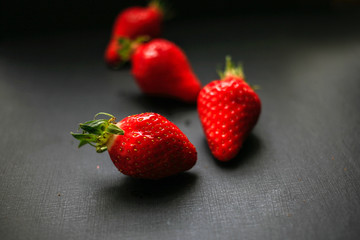 Delicious strawberrys on black background