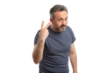 Man holding two fingers up
