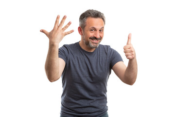 Man holding six fingers up