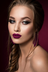 Fototapeta premium Make up. Glamour portrait of beautiful woman model with fresh makeup and romantic hairstyle.