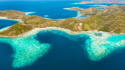 Islands of the Malayan archipelago with turquoise lagoons. Nature of the Philippines, top view....