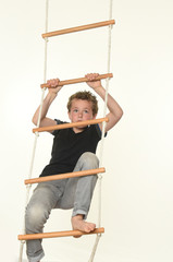child on a rope ladder