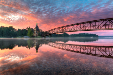 Church of Andrew on the River Vuoksa. Beautiful summer sunrise. Leningrad Oblast, Russia