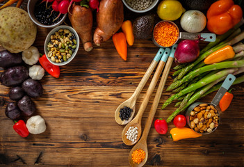 Fototapeta na wymiar Assortment of fresh vegetables on wooden background