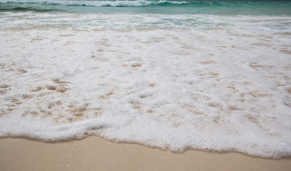 The texture of a beautiful blue wave on the ocean
