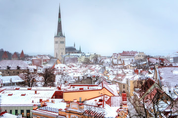 Cityscape with Medieval Old Town, St. Olaf Baptist Church, Tallinn, Estonia. Beatiful winter view...