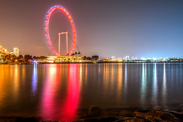 Obraz premium Singapore, Night view of ferris wheel in singapore
