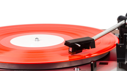 Close up of turntable needle on a vinyl