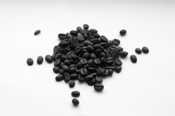 Coffee beans on white in black and white.