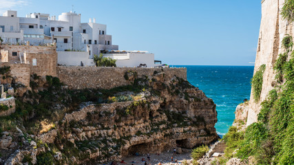 Rough sea on the coast of Puglia. Enchantment of Polignano a Mare. Italy