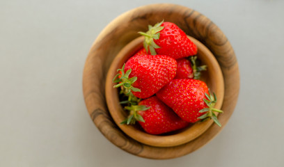 Top View Wooden Bowls Fresh Strawberries Table