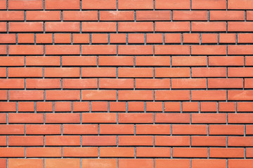Red stone brick wall texture and background seamless