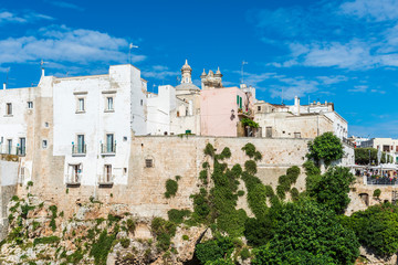 Rough sea on the coast of Puglia. Enchantment of Polignano a Mare. Italy