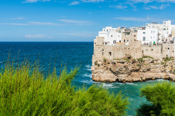 Rough sea on the coast of Puglia. Enchantment of Polignano a Mare. Italy