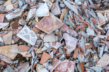 Old broken ceramic tiles. Selective focus.