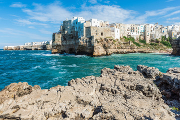 Rough sea on the coast of Puglia. Enchantment of Polignano a Mare. Italy