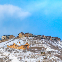 Clear Square Beautiful homes built on top of a mountain covered with snow in winter