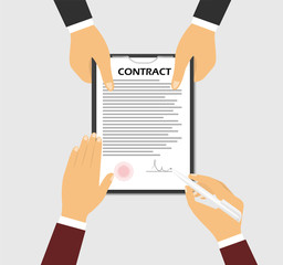 Signing a contract. The concept of one hand holding a contract
