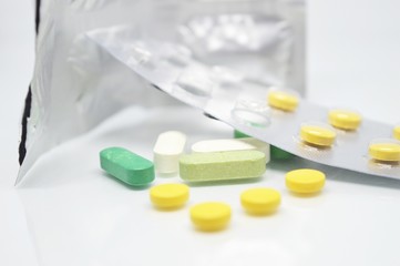 Fototapeta na wymiar photos of capsule medicine with bright background isolated.