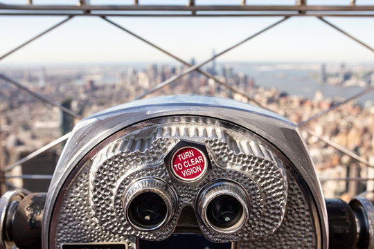 binocular in the empire state - Powered by Adobe