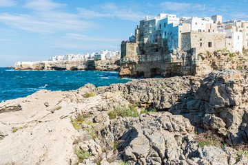 Rough sea on the coast of Puglia. Enchantment of Polignano a Mare. Italy