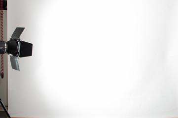 A real white background of a studio with a spotlight