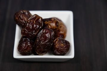 Medjool Dates on wooden table