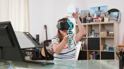 Cute teenager girl wearing a VR headset learning about DNA based on a 3D holographic projection in front of her. The future of education and learning - Powered by Adobe