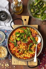 Chorizo and yellow split peas stew with padrones peppers
