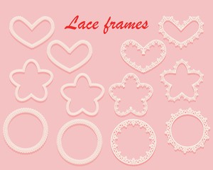 Set of white carved frames of various shapes. Ring, heart and flower of lace. Ornate vintage elements isolated on a pink background