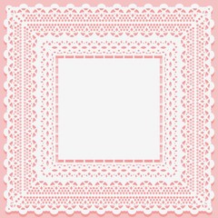 White lacy square doily isolated on a pink background. Openwork lace frame towel mat.