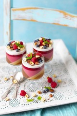 Jelly dessert like panna cotta - layers of chocolate, coffee, berries and coconut