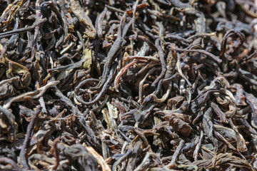 Dried leaves of Pu-erh Tea Mao-Cha 
