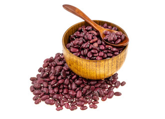 Red beans in a wooden dishes with a spoon isolated on white background