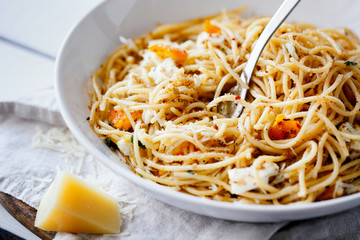 Quick and delicious italian pasta spaghetti with fried eggs, pangrattato and grated parmesan on...