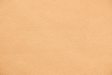 Fototapeta premium The texture of genuine leather. Impeccable and stylish background. Beautiful stylish background. Natural skin texture close up. Brown background. The structure of the leather material brown shades.