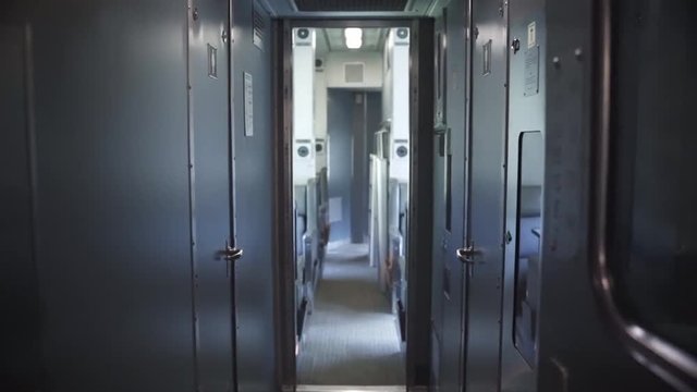 Slow forwards movement showing the interiors of a travel train.