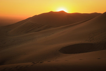 The highest sand dunes in the world at sunset in Namib Desert, in the Namib-Nacluft National Park in Namibia. Sossusvlei