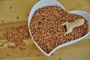 buckwheat raw brown in a porcelain cup