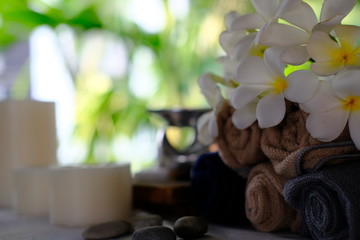 spa setting aromatherapy candles in natural bokeh background