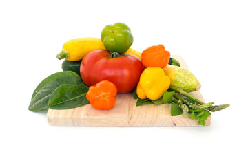 Fresh summer vegetables isolated on white background