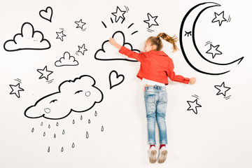 top view of cheerful kid flying near moon and stars on white