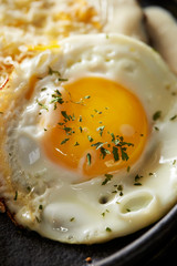 fried eggs with bacon and cheese