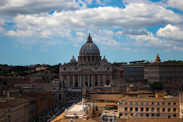 Fototapeta na wymiar St. Peter's Basilica in the Vatican surrounded by old buildings
