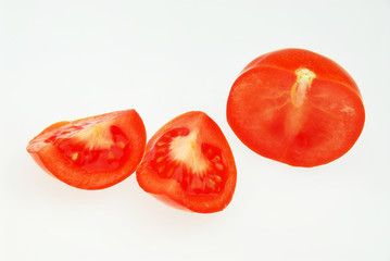 Sliced fresh tomato isolated on the white background