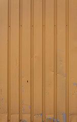 Fototapeta premium Old Weathered Brownish Vertically Stripped Metal Panels